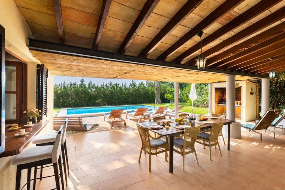 Patio, Day, Natural landscape, Living room, Seating area, Pool view, Swimming pool, sunbed