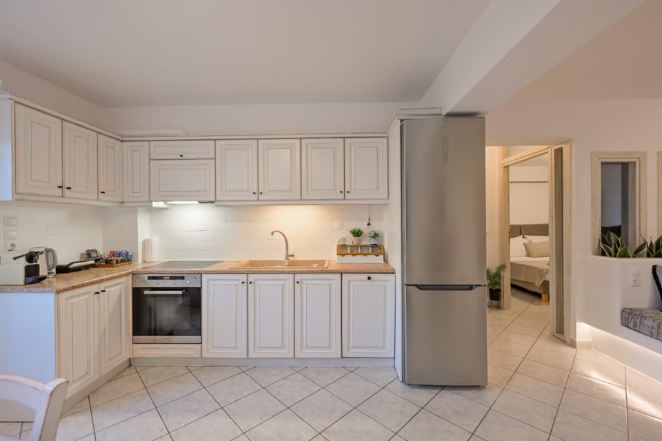 Kitchen or kitchenette, dishwasher, oven, stove, toaster