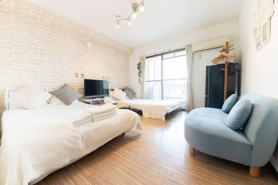 Sanacion Motomachi 6 なんば徒歩圏内 Netflix視聴可能 2部屋セット貸しでプライベートも確保 Apartment in Osaka