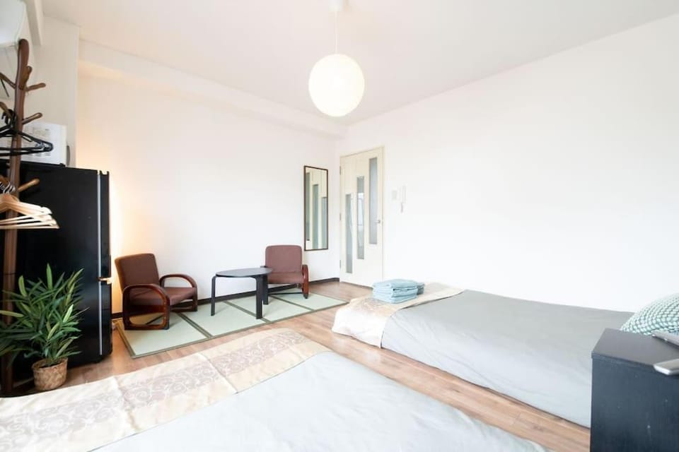 Sanacion Motomachi 6 なんば徒歩圏内 Netflix視聴可能 2部屋セット貸しでプライベートも確保 Apartment in Osaka
