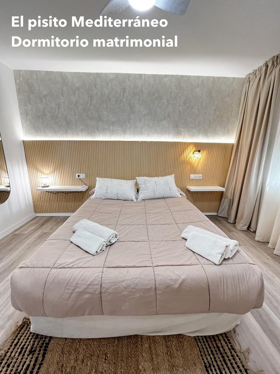 Bed, Photo of the whole room, Bedroom, Text overlay, towels