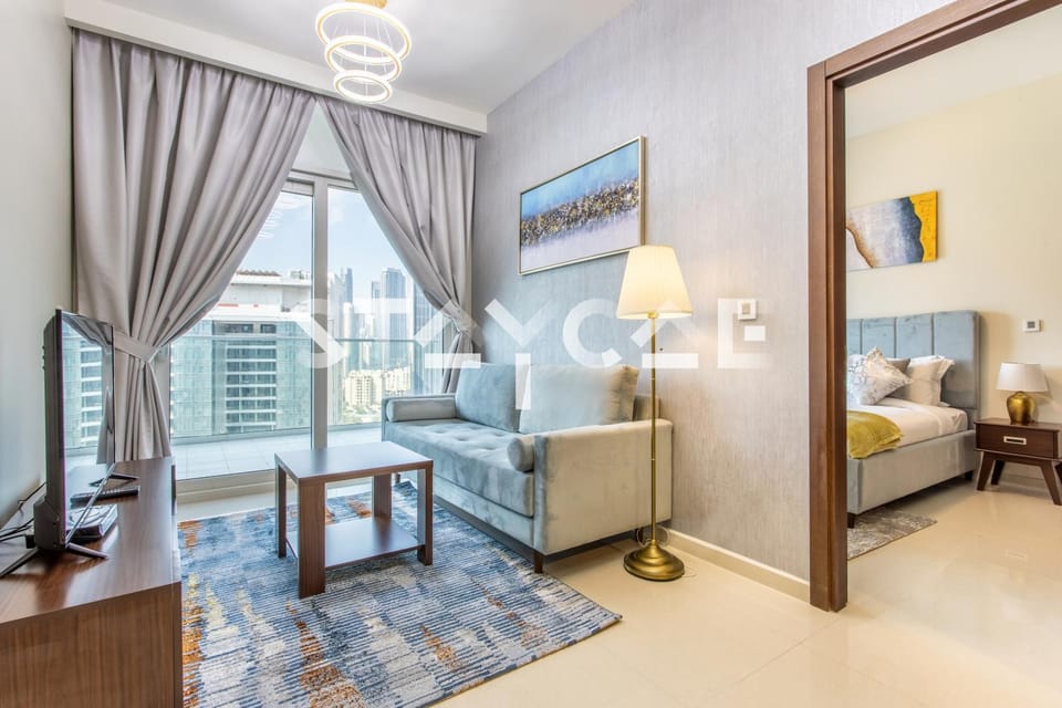 Bed, TV and multimedia, Living room, Seating area, Bedroom