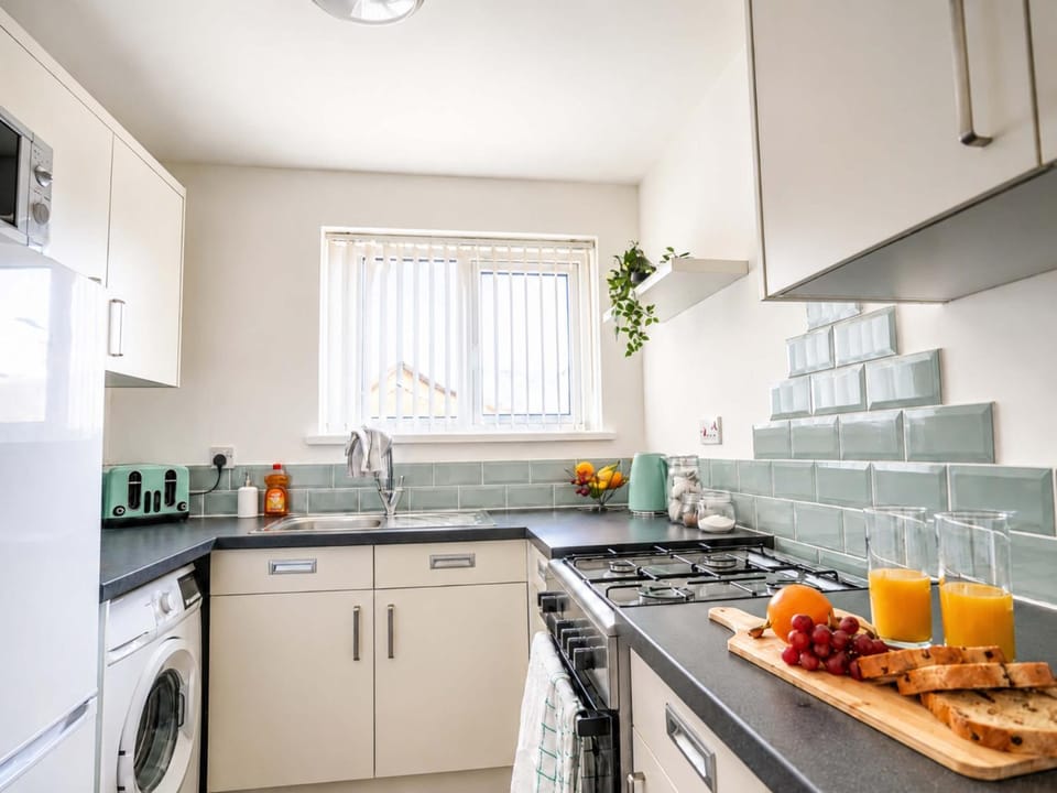 microwave, oven, stove, toaster, washing machine, kitchen