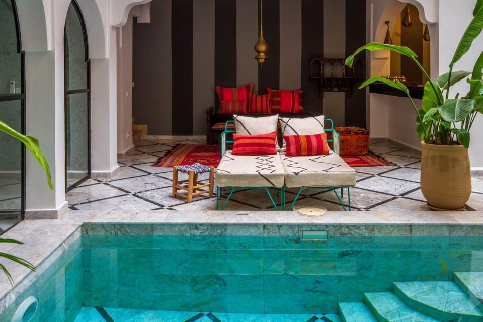 Patio, Living room, Seating area, Pool view, Swimming pool