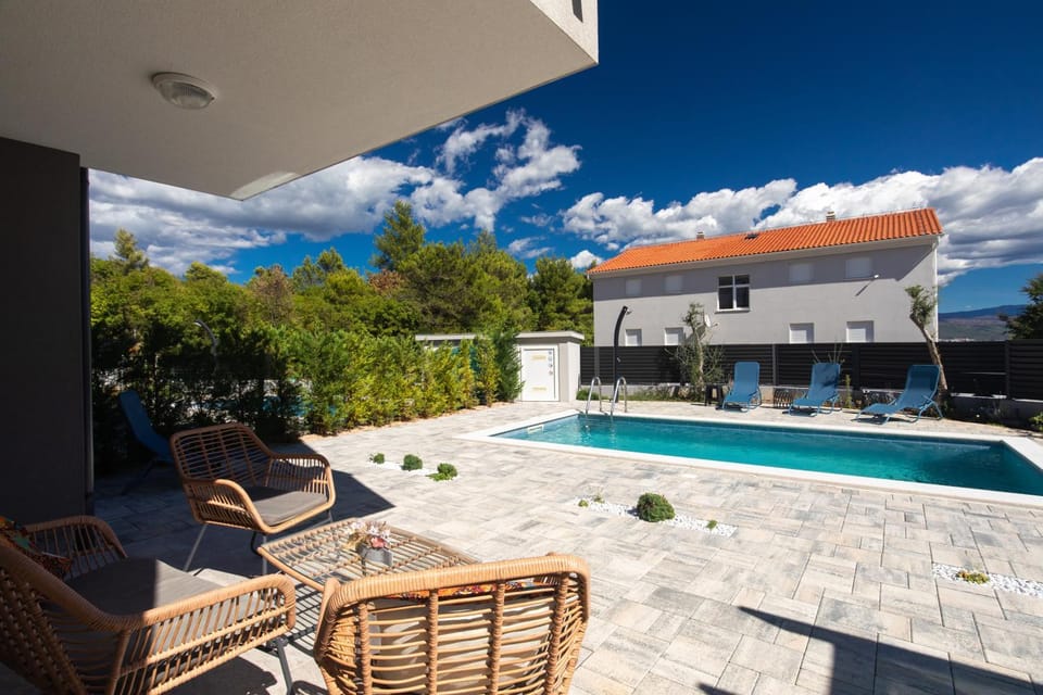 Patio, Seating area, Swimming pool, sunbed