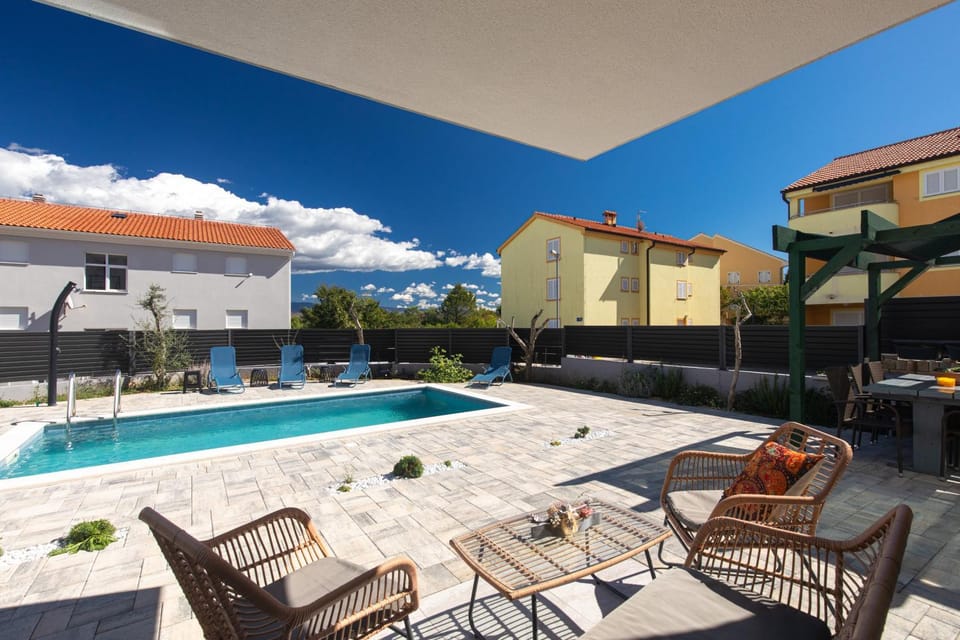 Patio, Seating area, Swimming pool, sunbed