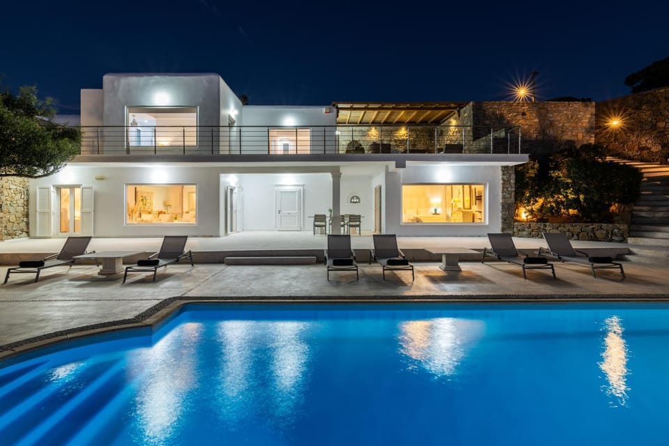 Property building, Patio, Night, Pool view, Swimming pool, sunbed