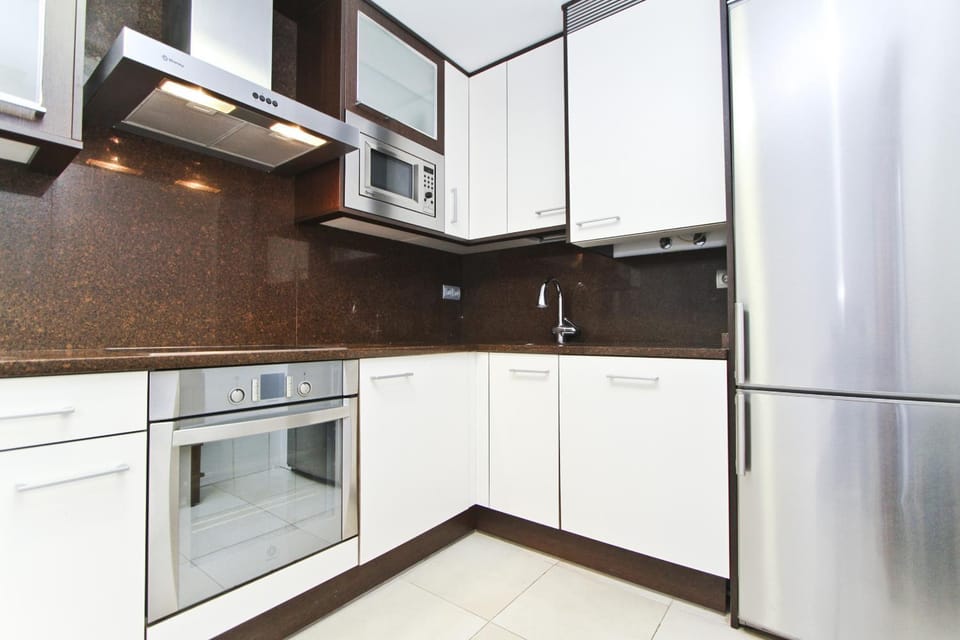 Kitchen or kitchenette, oven, stove