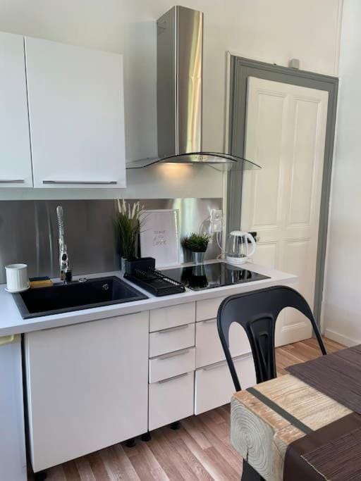Kitchen or kitchenette, stove