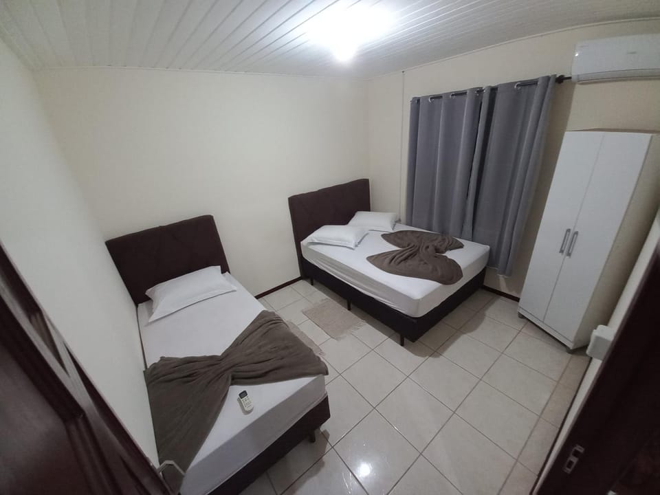 Bed, Photo of the whole room, towels, air conditioner