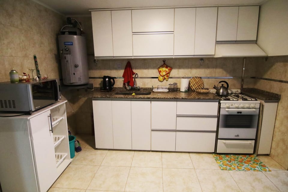 Kitchen or kitchenette, oven, stove