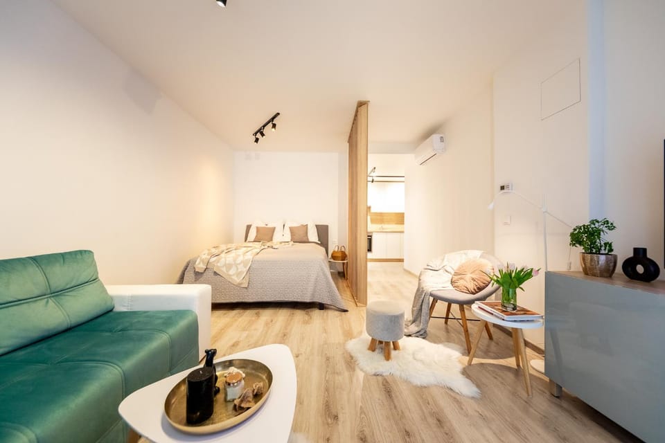 Bed, Living room, Seating area, Bedroom