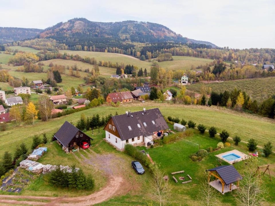 Property building, Natural landscape, Bird's eye view, Mountain view, Swimming pool