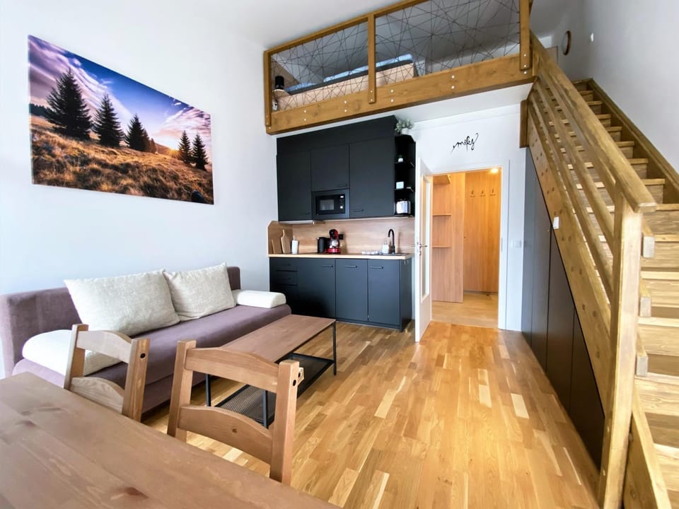 Kitchen or kitchenette, Living room, Seating area, Dining area