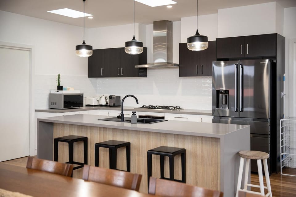 Kitchen or kitchenette, dishwasher, oven, stove