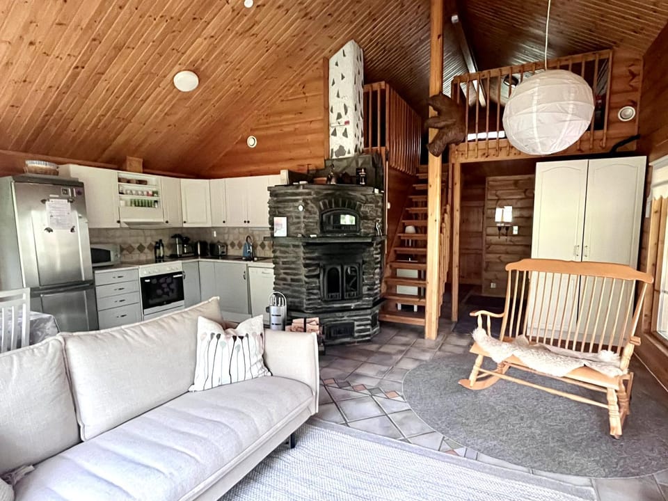 Communal lounge/ TV room, Kitchen or kitchenette, Living room, Decorative detail, Seating area, Dining area, dishwasher, fireplace, oven, stove, kitchen, air conditioner