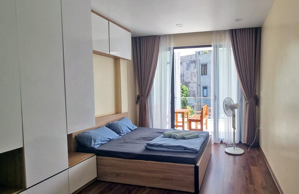 Bed, Balcony/Terrace, Seating area, Bedroom, fireplace, towels, wardrobe
