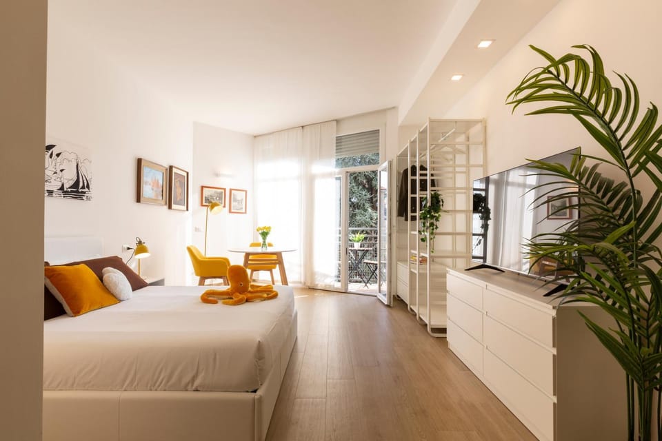 Bed, Day, Seating area, Bedroom
