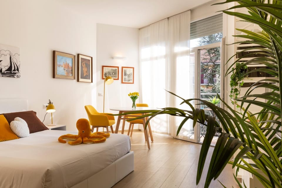 Bed, Day, Seating area, Bedroom