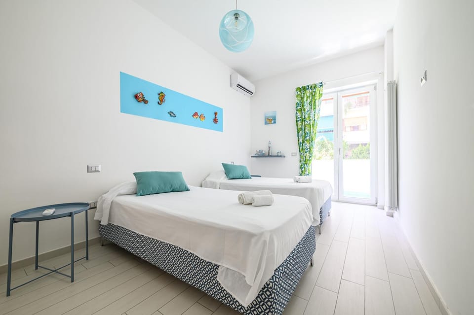 Bed, Photo of the whole room, Bedroom, towels, air conditioner