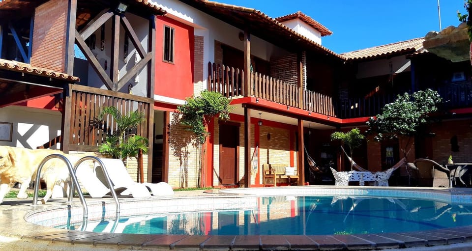 Property building, Day, Pool view, Swimming pool, sunbed