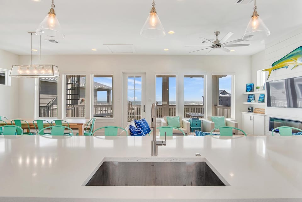 View (from property/room), Living room, Seating area, Dining area, furniture, kitchen, air conditioner