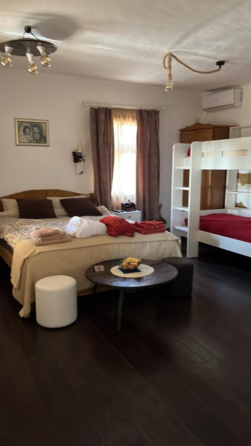 Bedroom, bunk bed, towels, air conditioner