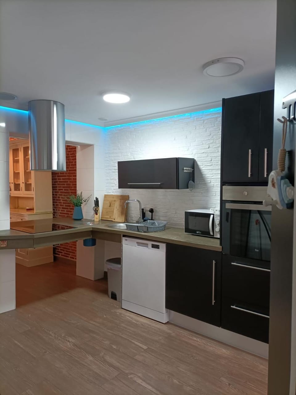 Kitchen or kitchenette, dishwasher, oven, stove, toaster