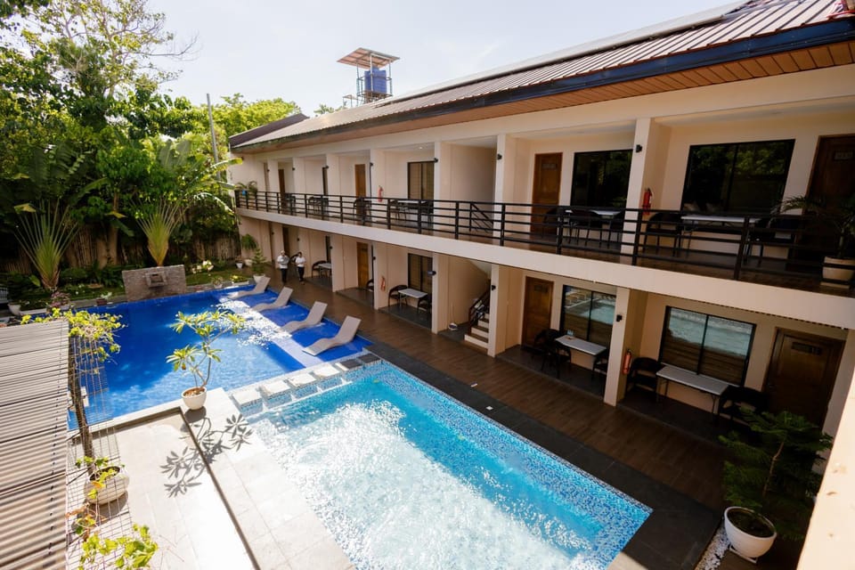 Property building, Pool view, Swimming pool, sunbed