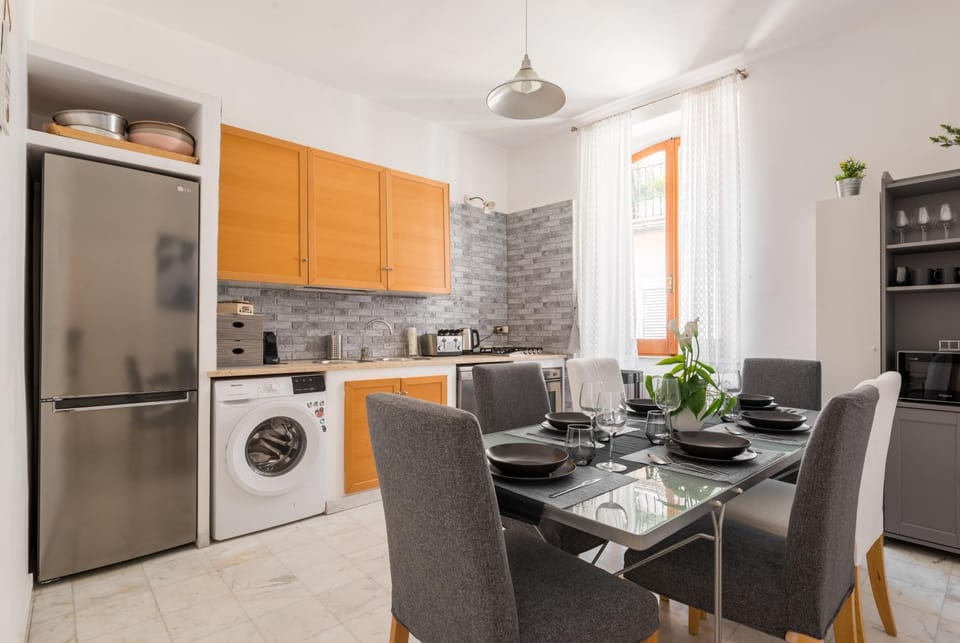 Kitchen or kitchenette, Dining area, stove, washing machine