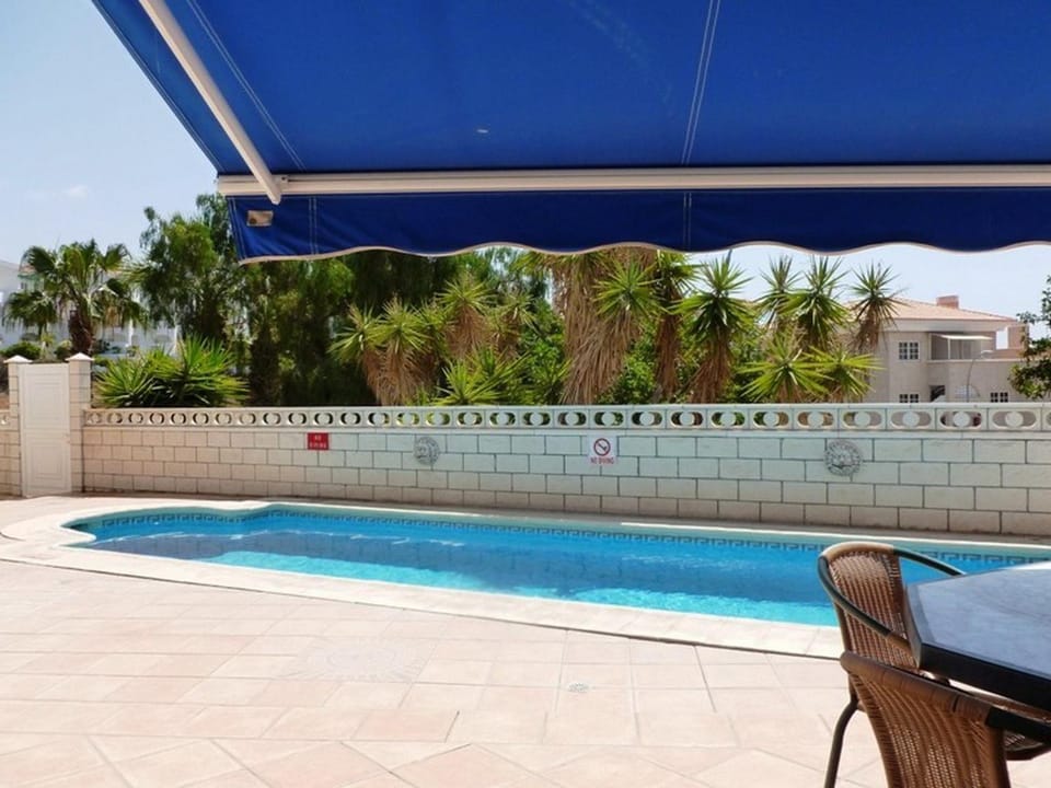 Property building, Living room, Swimming pool