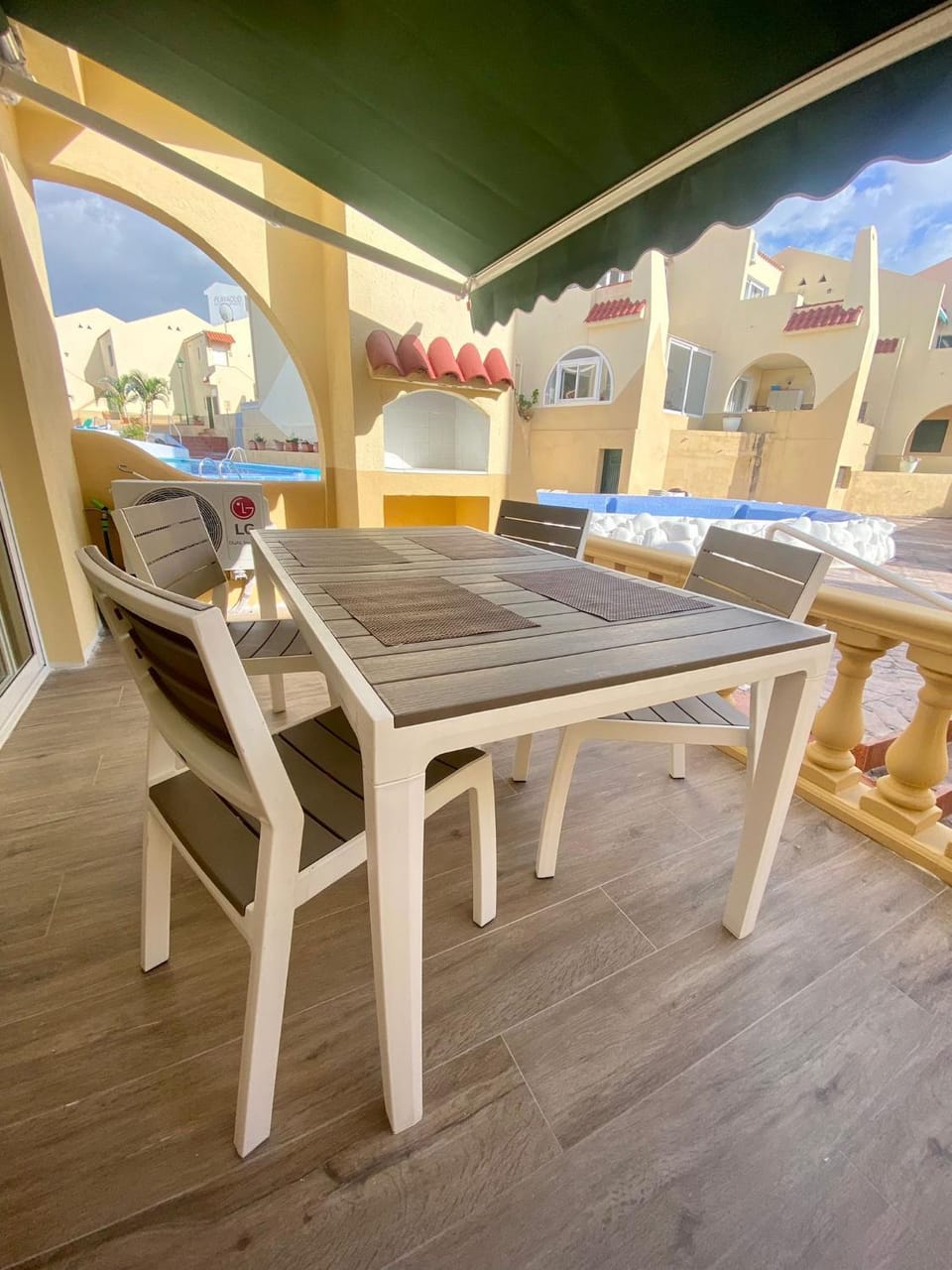 Property building, Patio, Balcony/Terrace, Dining area, Swimming pool