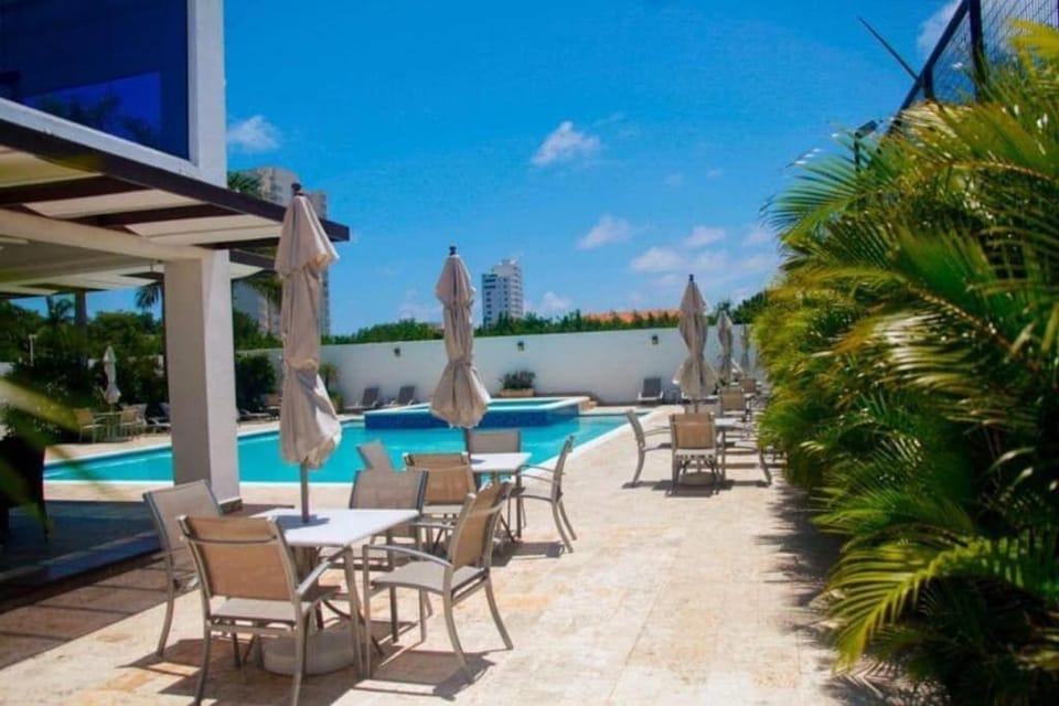 Property building, Patio, Day, View (from property/room), Garden view, Swimming pool, sunbed