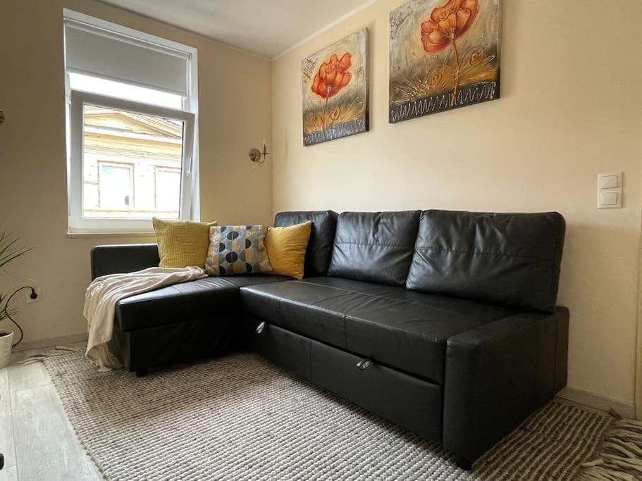 Modern 2BR Apt near Train Station w Free Parking & Family games Apartment in Latvia