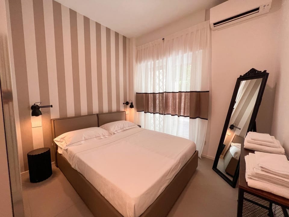 Bed, Photo of the whole room, Bedroom, hair dresser, towels, wardrobe, air conditioner