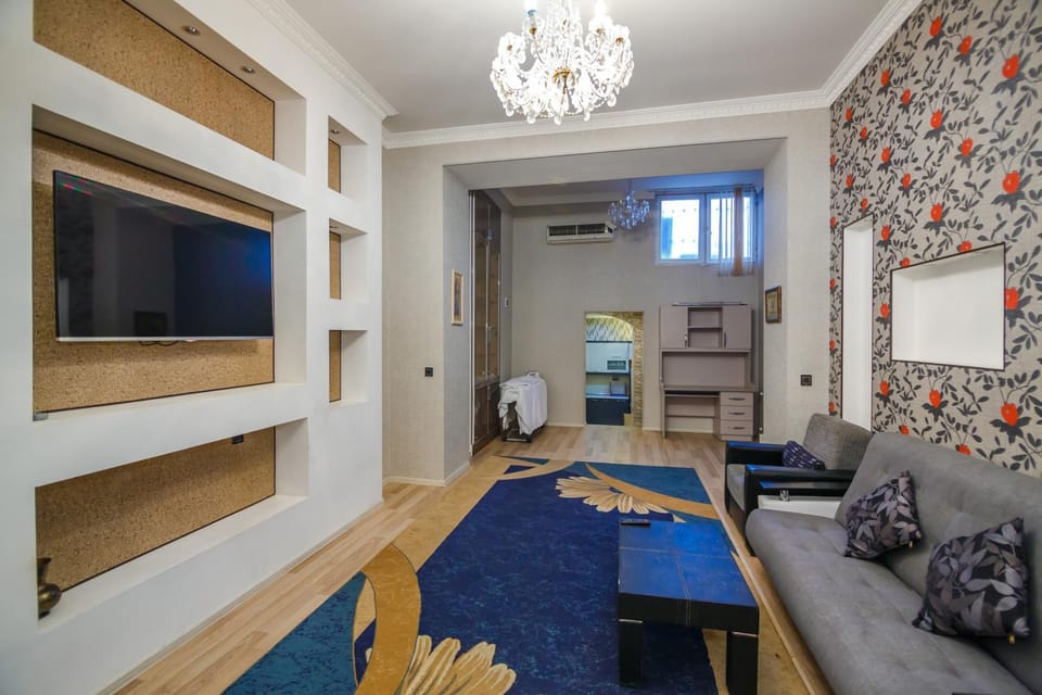 Communal lounge/ TV room, Bed, TV and multimedia, Living room, Photo of the whole room, Seating area, Evening entertainment, Bedroom, air conditioner