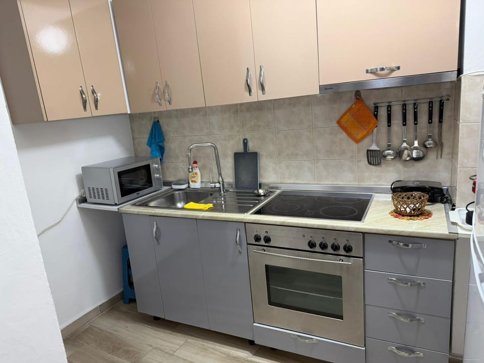 Kitchen or kitchenette, oven, stove, toaster
