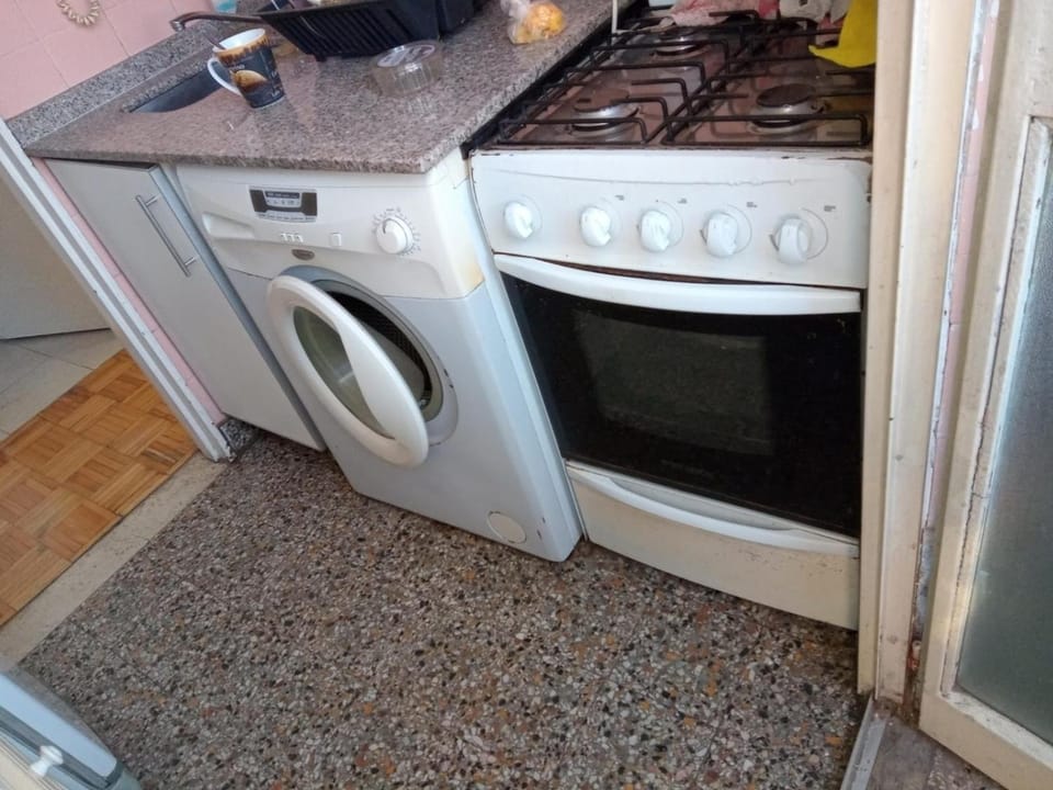 Kitchen or kitchenette, washing machine