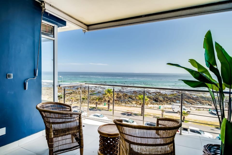 View (from property/room), Balcony/Terrace, Seating area, Beach, Sea view