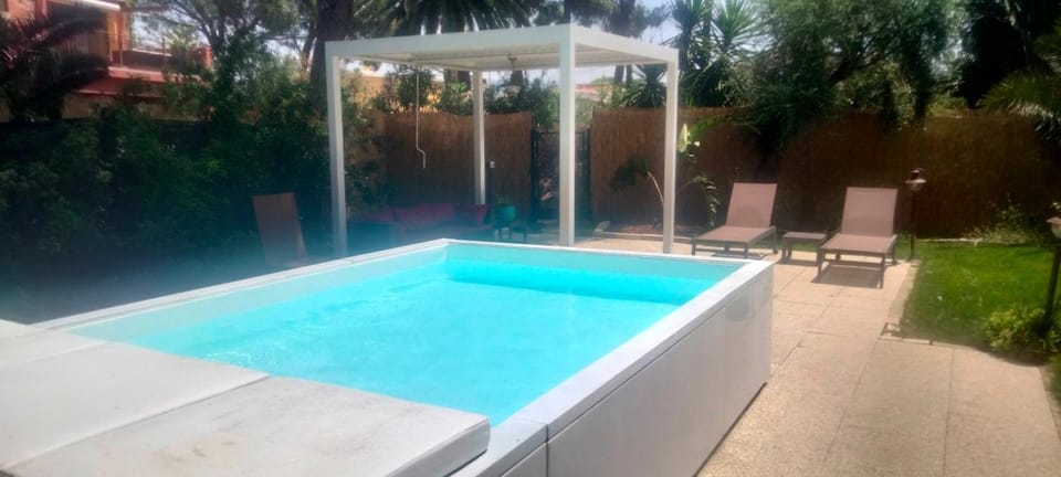 Property building, Living room, Swimming pool