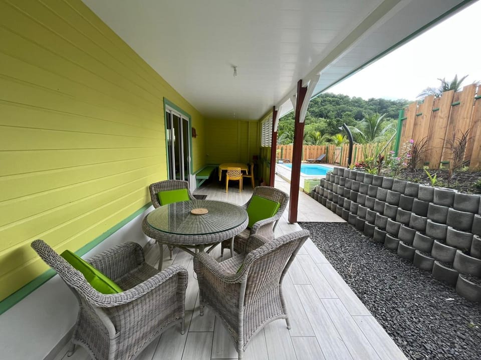 Patio, Seating area, Dining area, Pool view