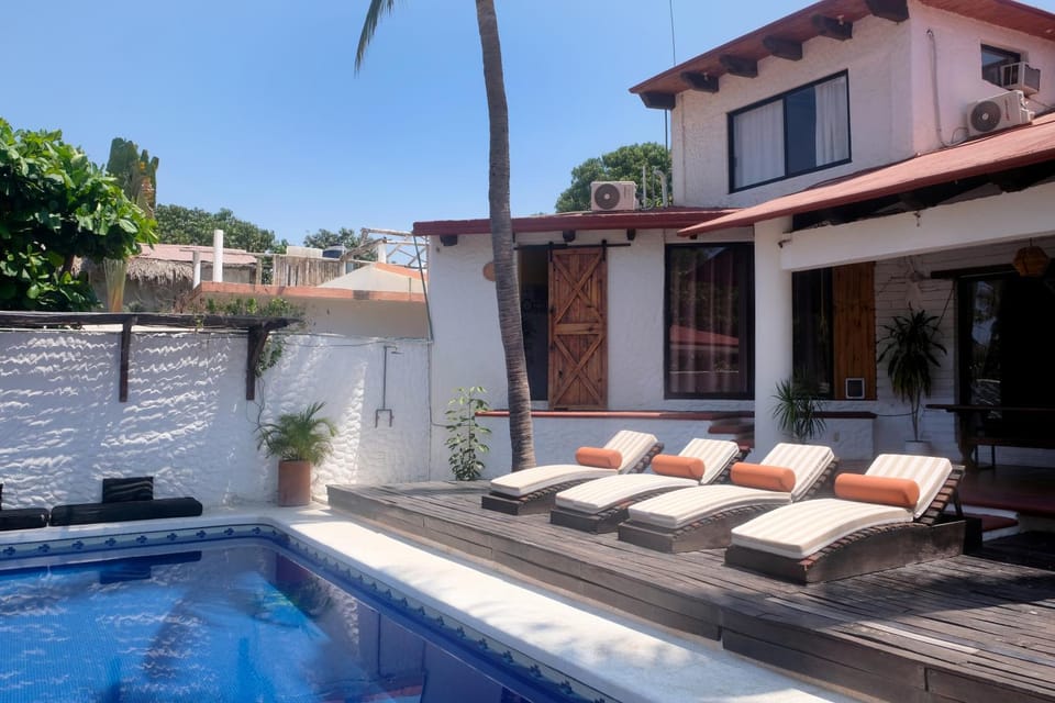 Property building, Seating area, Pool view, Swimming pool