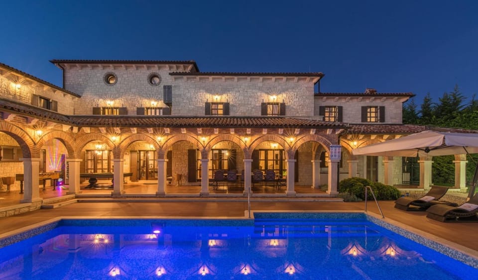 Property building, Patio, Night, Pool view, Swimming pool, sunbed