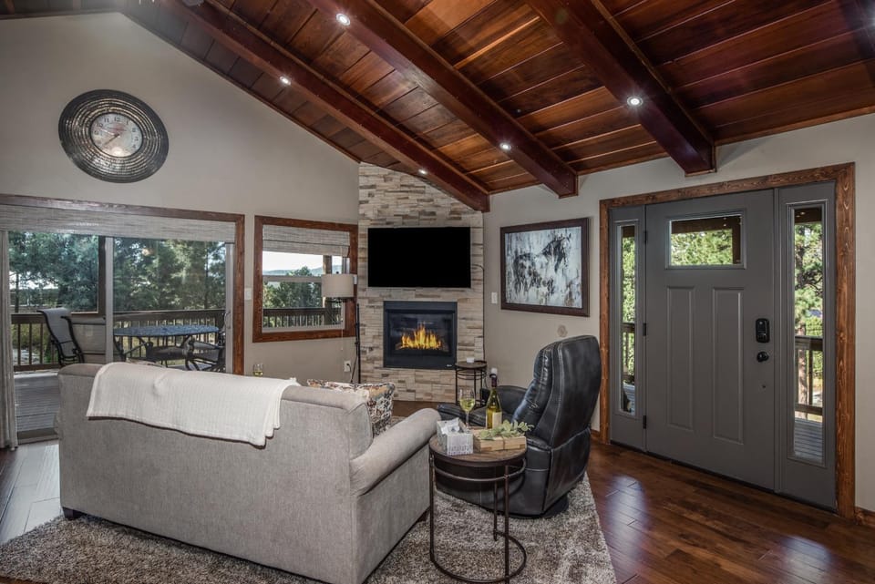 View (from property/room), Balcony/Terrace, Living room, Seating area, fireplace, furniture