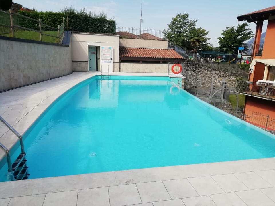 Property building, Day, Pool view, Swimming pool