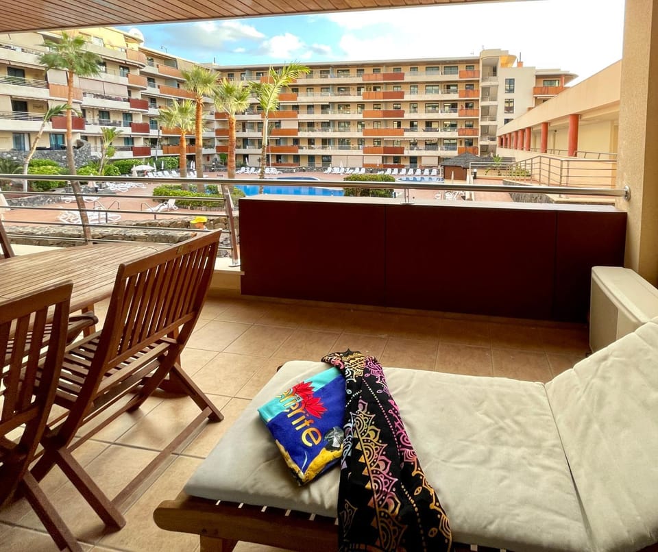 Property building, View (from property/room), Balcony/Terrace, Dining area, Swimming pool, sunbed