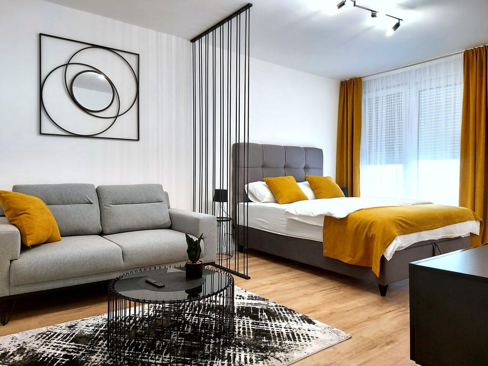 Bed, Living room, Seating area, Bedroom