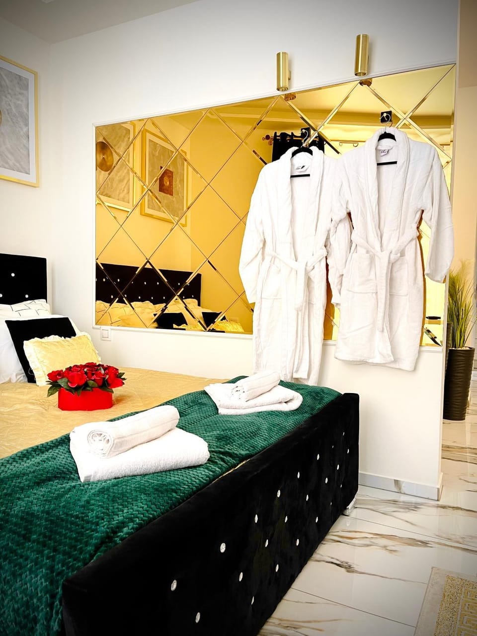 Bed, towels, wardrobe