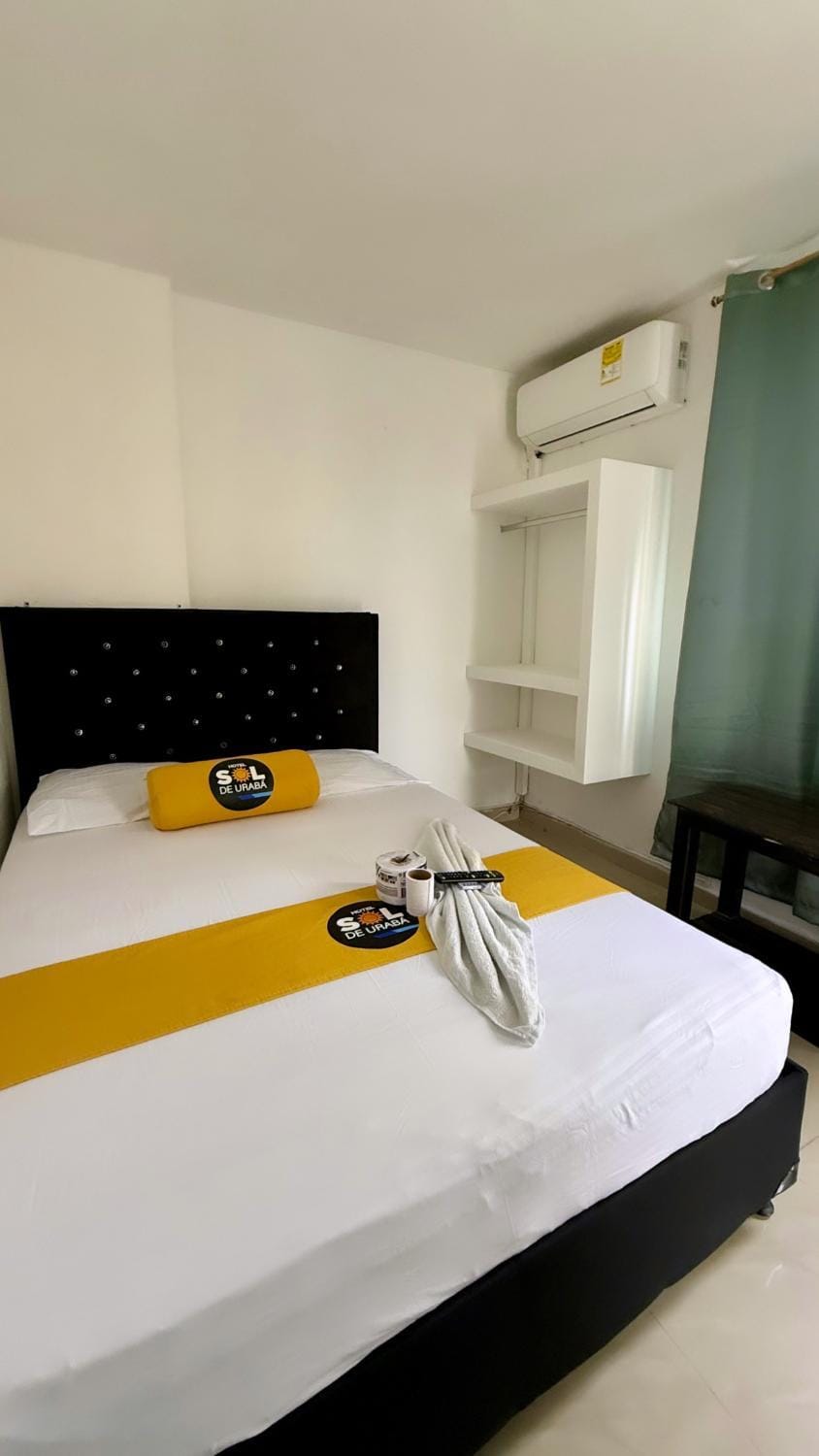 Bed, Photo of the whole room, Bedroom, towels, air conditioner