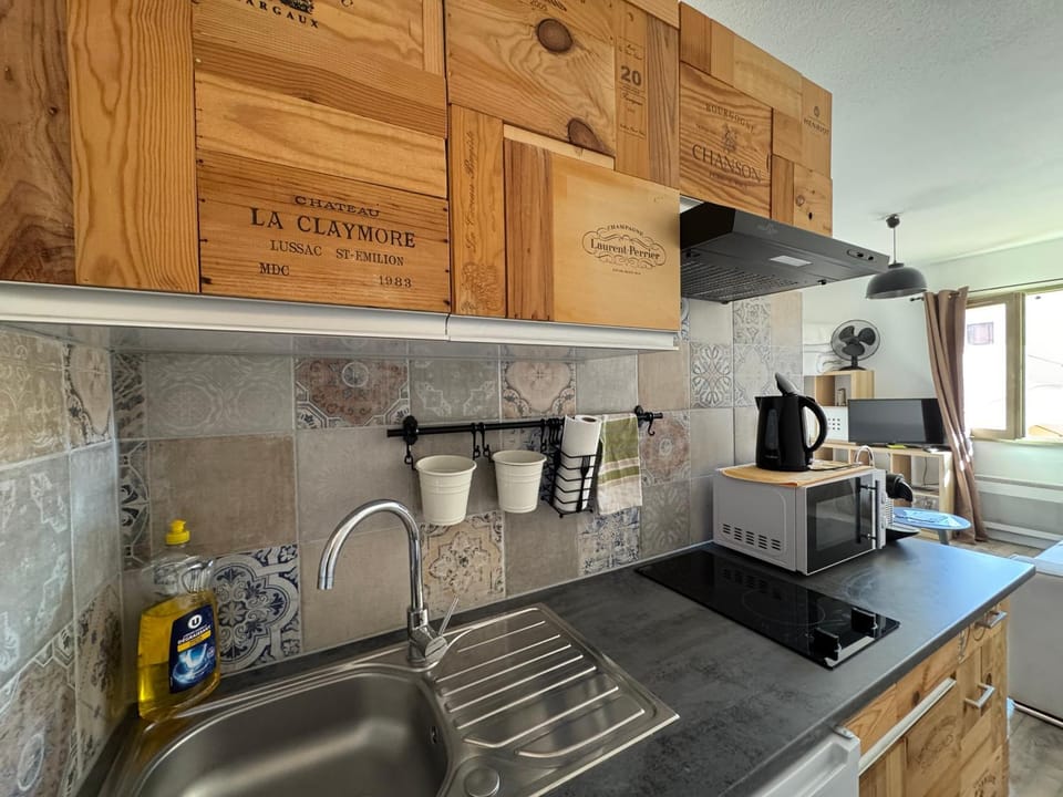 Kitchen or kitchenette, microwave